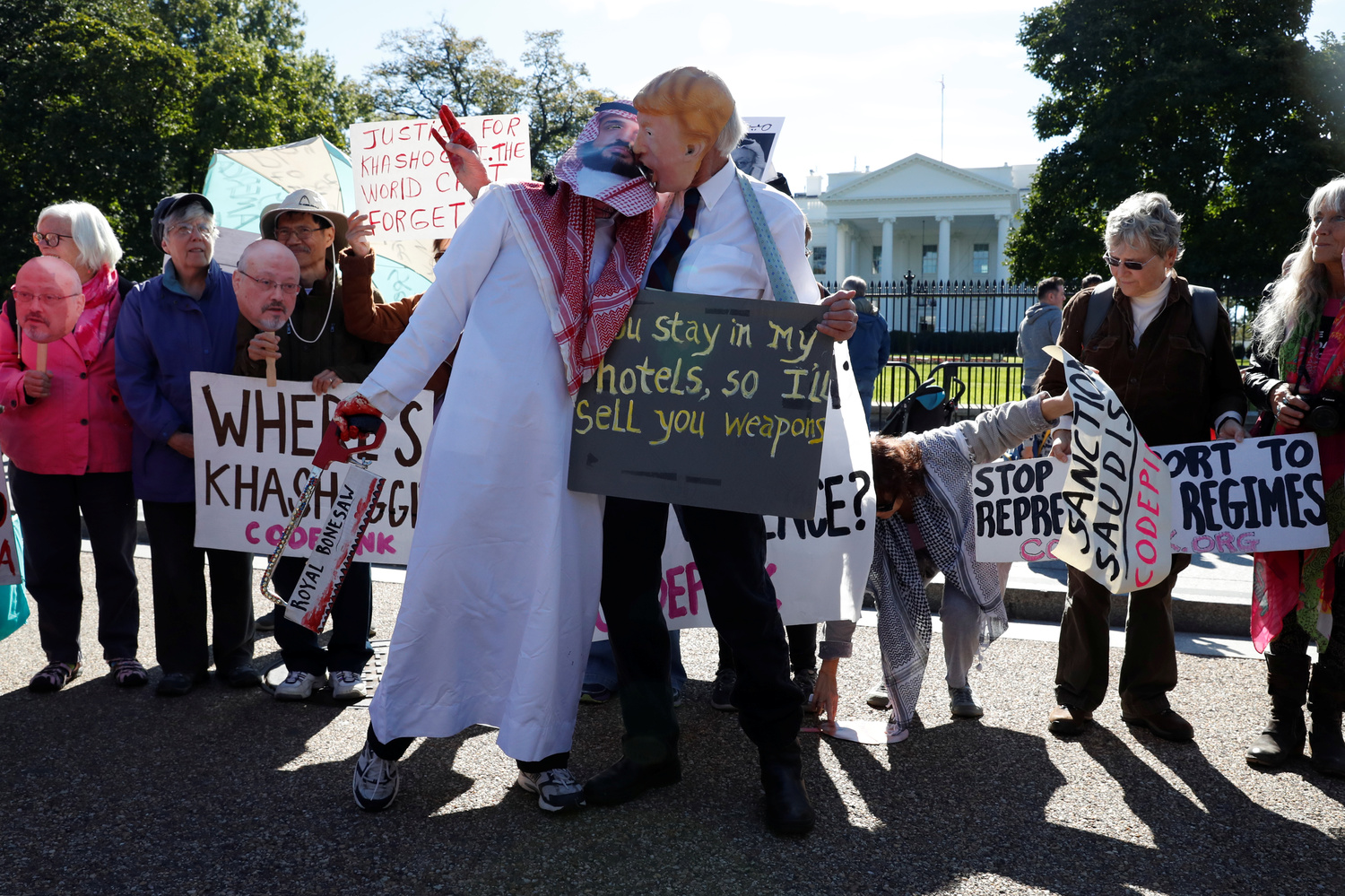 Activists protest the disappearance of Saudi journalist Jamal Khashoggi during demonstration outside the White House in Washington